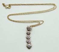 A 9ct gold chain with pendant set with small diamo