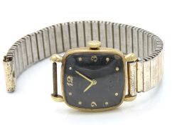 A 14ct gold cased gents Waltham wristwatch, strap