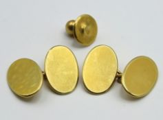A pair of 1919, 18ct gold cufflinks of plain form