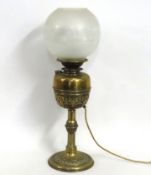 A Victorian brass oil lamp converted to electricit