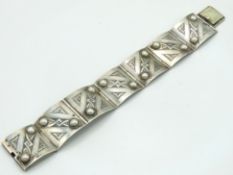 A white metal square link panel bracelet, 173mm lo