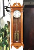 A mahogany cased Vienna-style regulator wall clock