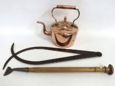A Georgian copper kettle twinned with a pair of 24