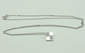 A 9ct white gold chain with contemporary pendant s