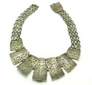 An early 20thC. silver plated nurses style belt, 6