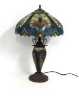 An elegant Tiffany style double-lit table lamp, 64