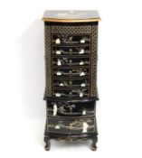 A Chinese lacquerware jewellery chest with gilding