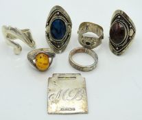 Six silver 7 white metal rings twinned with a silv