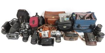 A collection of various cameras & accessories to i