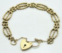 A 9ct gold Victorian style gate bracelet, 168mm lo
