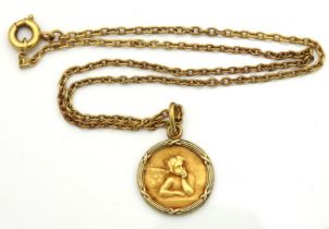 A child's yellow metal chain & pendant with cherub decor, tests electronically as 18ct gold, chain