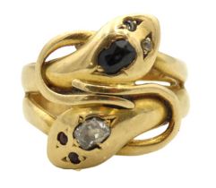 A 19thC. yellow metal double snake head ring set with diamond, sapphire & ruby, indistinct