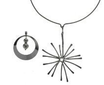 Circa 1975 abstract silver pendant necklace, and a Danish 830 standard pendant (2)