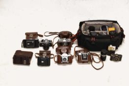 Collection of cameras and accessories
