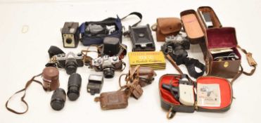 Collection of vintage cameras and camera equipment