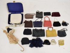 Good collection of vintage bags, handbags, and clutches, together with two Edwardian parasols
