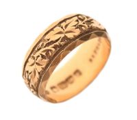 18ct gold wedding band with foliate decoration