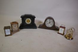 An antique slate mantle clock, a Napoleon hat mantle clock, a brass cased Swiss made carriage clock,