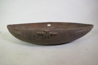 Oceania, tribal wood bowl with carved decoration, 98cm long