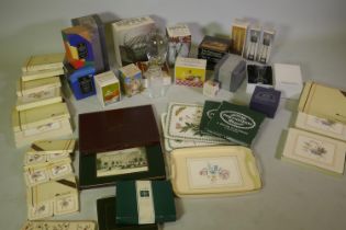 A quantity of Dartington crystal ware, vases and candleholders, and a quantity of place mats and