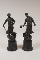 A pair of spelter figures of metal workers, 28cm high