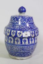 Moroccan blue and white ceramic jubbana jar and cover, 29cm high