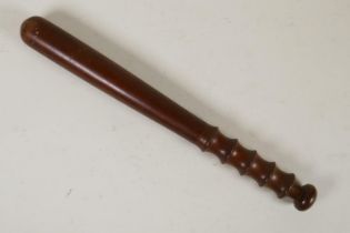 An antique turned wood truncheon, 38cm long