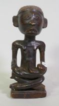 African carved wood maternity figure, 34cm high