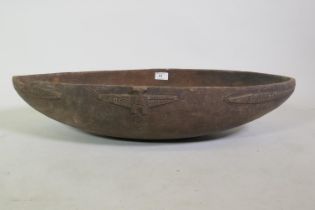 Oceania, tribal wood bowl with carved decoration, 73cm long
