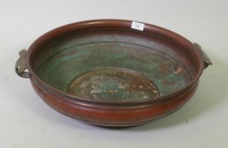 Antique oriental copper bowl with brass handles, 47cm diameter