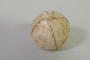 C19th stitched leather golf ball, 4cm diameter
