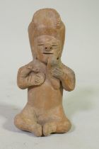 Terracotta seated figure, possibly pre-Columbian, 17cm high