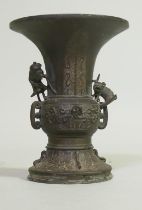 Antique Japanese bronze vase with raised decoration and applied figures of an old man with walking
