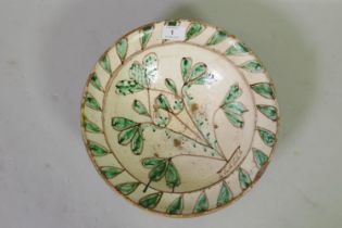 Antique continental tin glazed faience terracotta bowl with decoration in emerald green glaze and