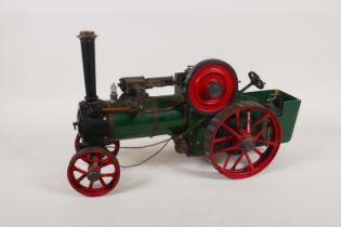 A vintage scratch built live steam traction engine, 40cm long