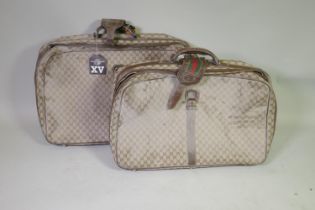 Two vintage Gucci soft suitcases, 70 x 46 x 20cm