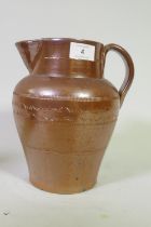 A C19th salt glazed stoneware jug, 23cm