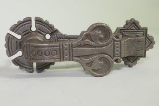 Christopher Dresser, (1834-1904), a Victorian Aesthetic style cast iron door knocker, stamped A.K. &