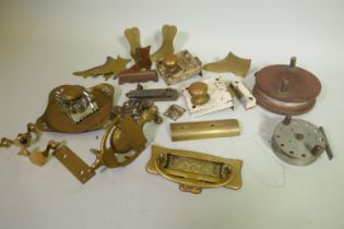 Quantity of vintage brass door furniture, an inkwell, fishing reels etc