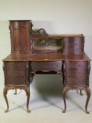 A Victorian walnut desk/bonne heure de jour, stamped Jas Shoolbred & Co, the upper section with