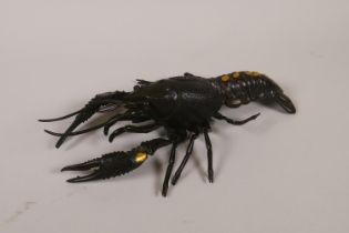 A Japanese Jizai style bronze okimono lobster with articulated limbs, 26cm long