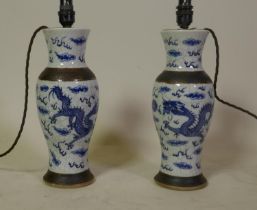 Pair of antique Chinese crackleware vases with blue and white dragon decoration, converted to lamps,
