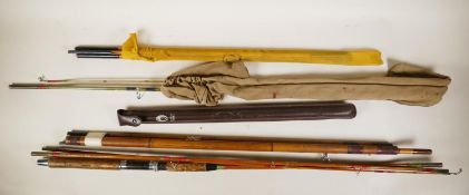 A collection of five vintage fly fishing rods