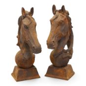 Pair of antique cast iron garden finials or statues of horse heads or busts