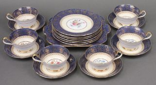 An Aynsley 19 piece gilt and Coalport blue pattern tea service, decorated roses, comprising twin