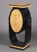 A Koefoed style Art Deco figured walnut and ebonised pedestal chest of 4 drawers, raised on a shaped