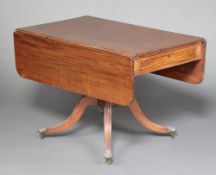 A 19th century mahogany pedestal Pembroke table fitted a drawer, raised on ring turned column and