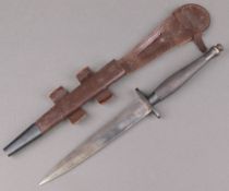 A Wilkinson type III Second Pattern Fairbairn Sykes fighting dagger, the 17cm blade etched "The F-