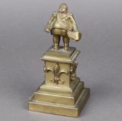 A Napoleonic period bronze figure/paperweight of King Louis XVIII, the centre King Louis tipping