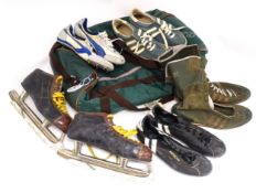 Film / movie memorabilia: an Adidas sports holdall containing a quantity of vintage sports footwear,